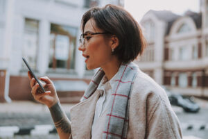 A woman reading about screen addiction treatment on her phone